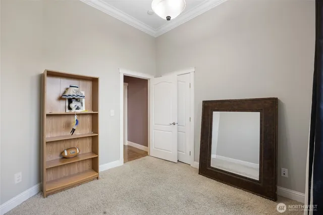 a view of a hallway with closet