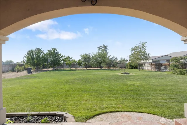 a view of a golf course with a lake