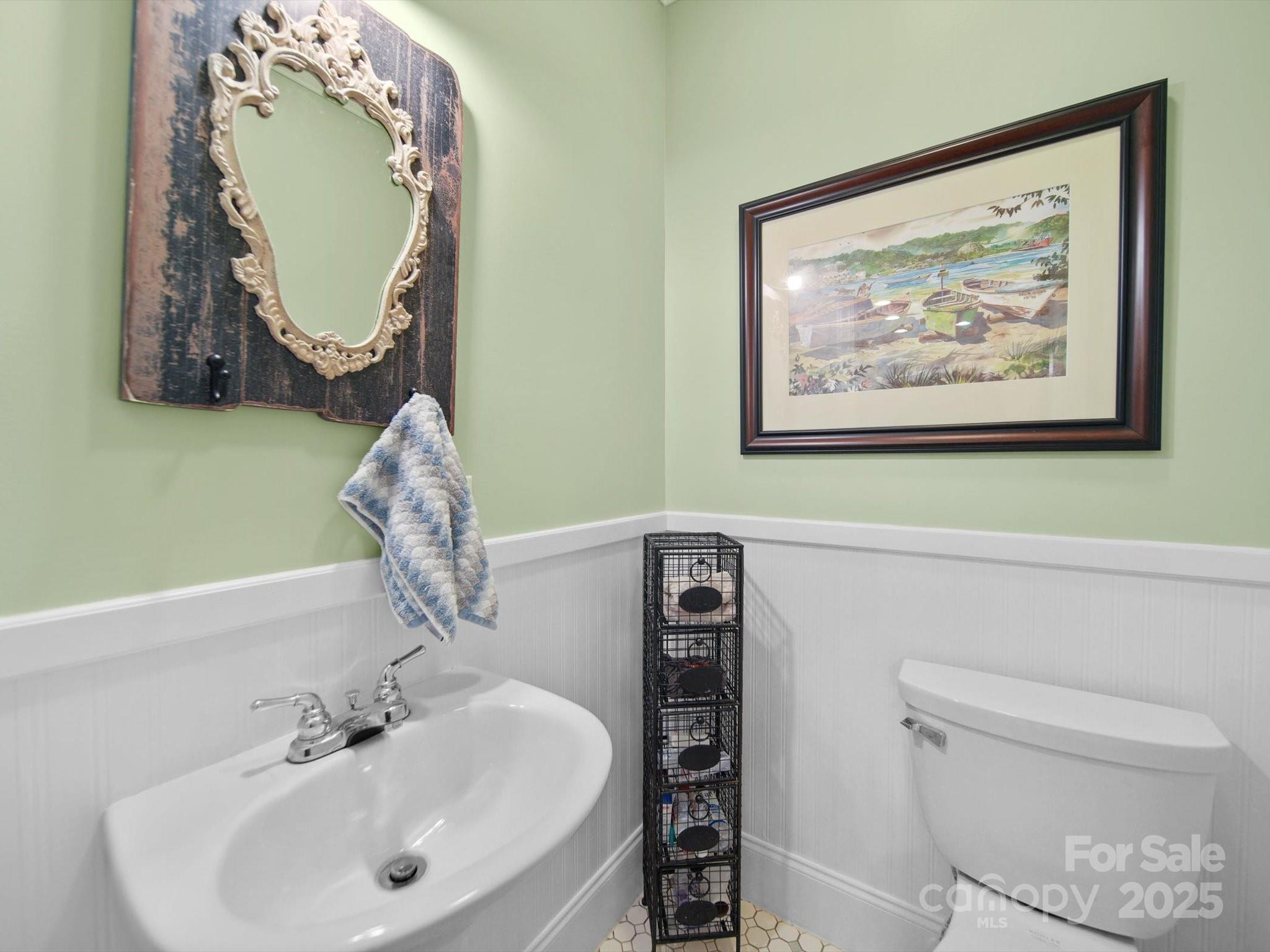 1393 Wateree Road Ridgeway, SC 29130 - Photo 13 of 42 a bathroom with a toilet and a sink