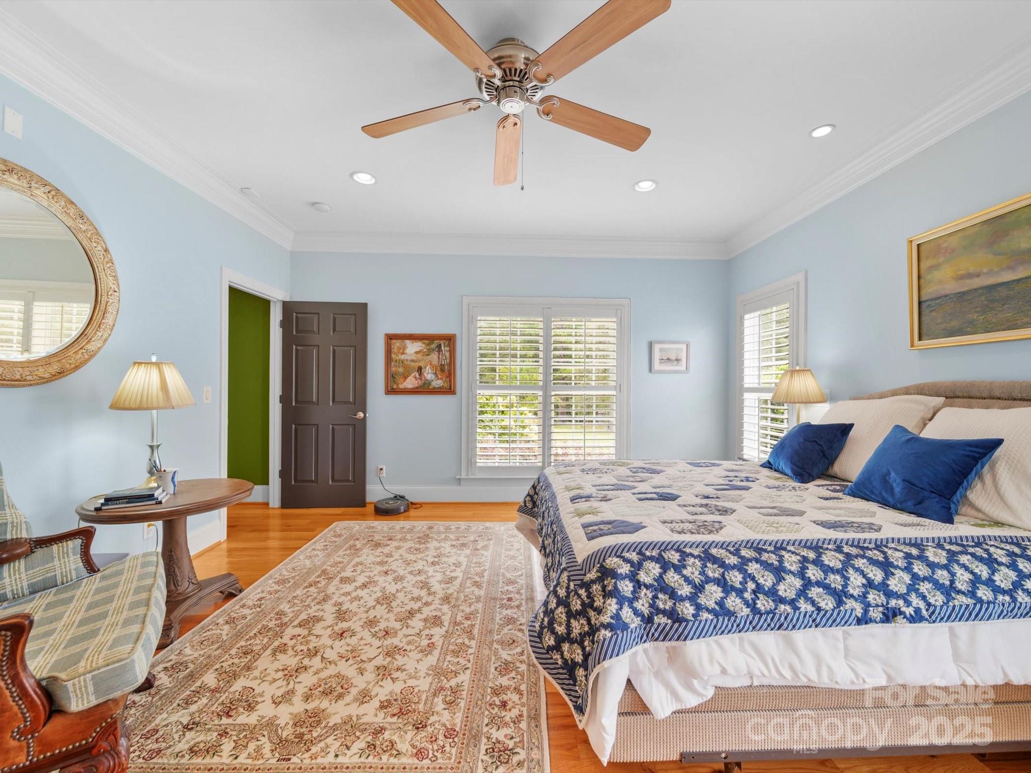 1393 Wateree Road Ridgeway, SC 29130 - Photo 16 of 42 a bedroom with a bed lamps and window