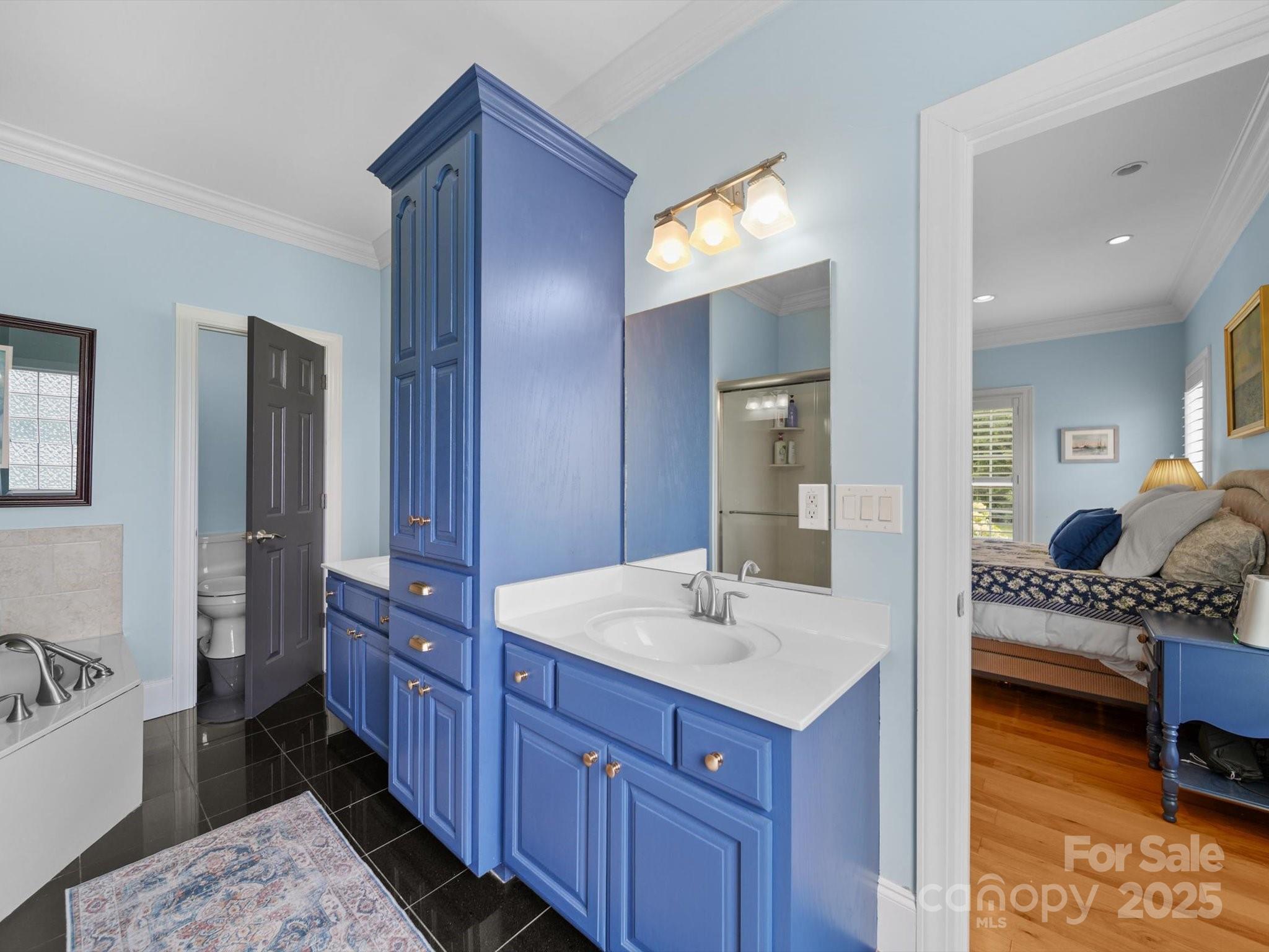 1393 Wateree Road Ridgeway, SC 29130 - Photo 18 of 42 a en suite bathroom with a sink and a mirror