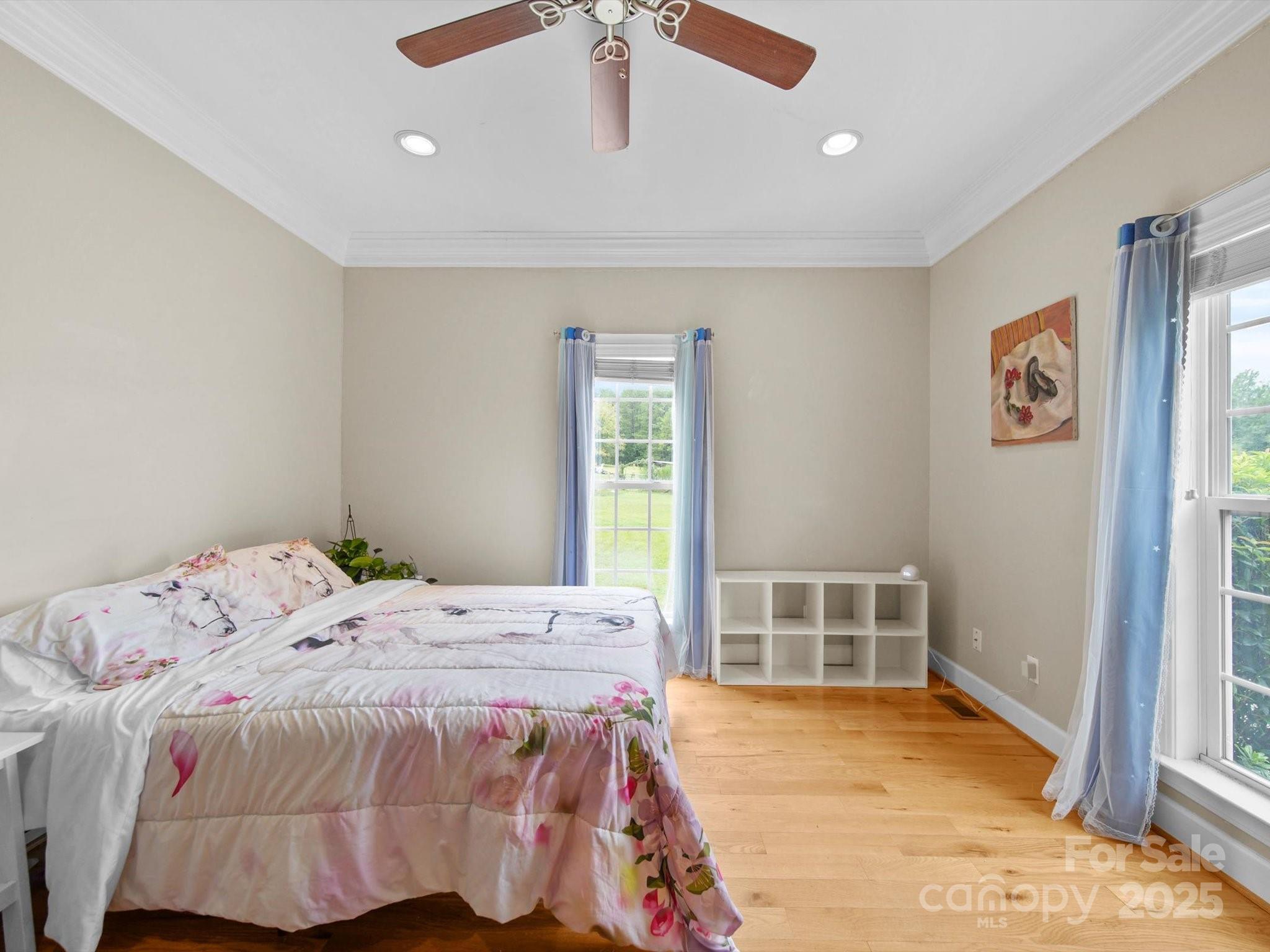 1393 Wateree Road Ridgeway, SC 29130 - Photo 22 of 42 a bedroom with a bed and a window