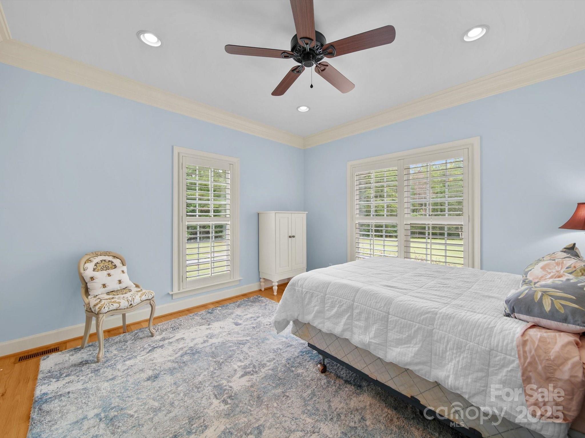 1393 Wateree Road Ridgeway, SC 29130 - Photo 26 of 42 a bedroom with a bed chair and window