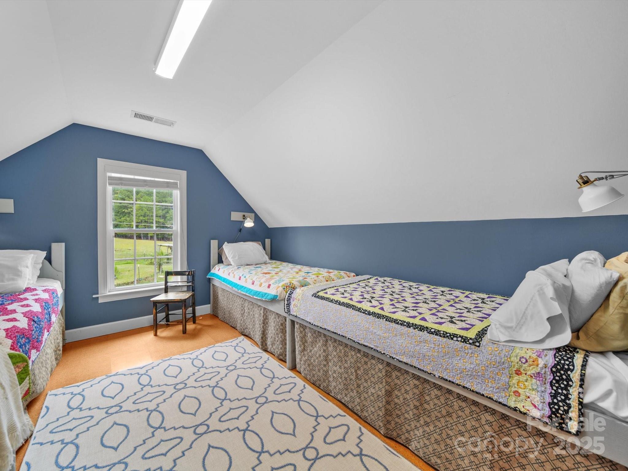 1393 Wateree Road Ridgeway, SC 29130 - Photo 31 of 42 a bedroom with furniture and a window