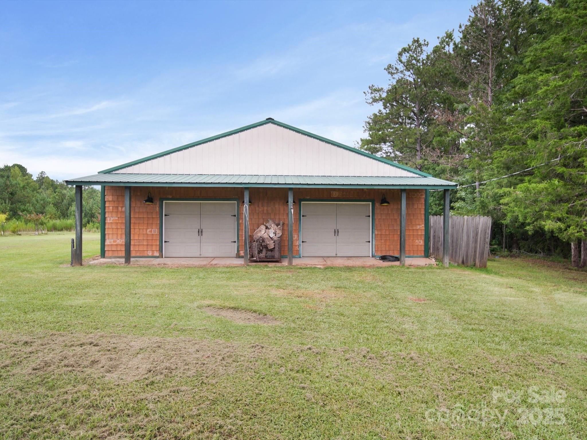 1393 Wateree Road Ridgeway, SC 29130 - Photo 37 of 42 a front view of house with yard and trees