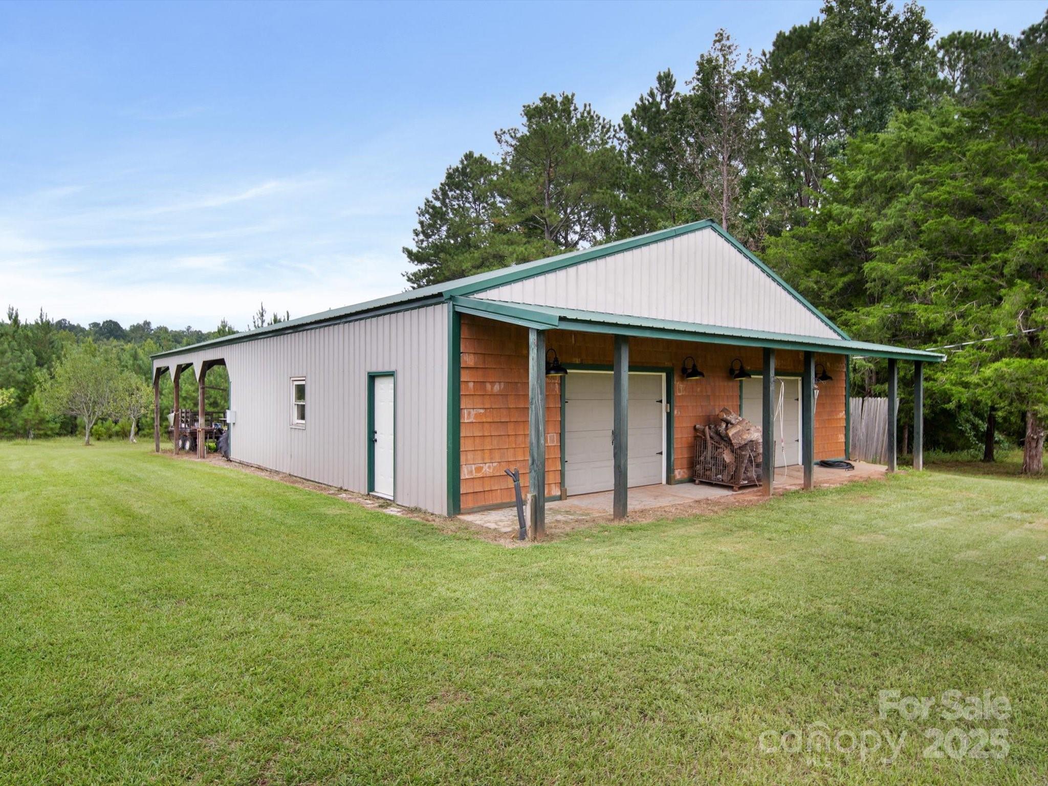 1393 Wateree Road Ridgeway, SC 29130 - Photo 38 of 42 a view of a house with backyard and garden