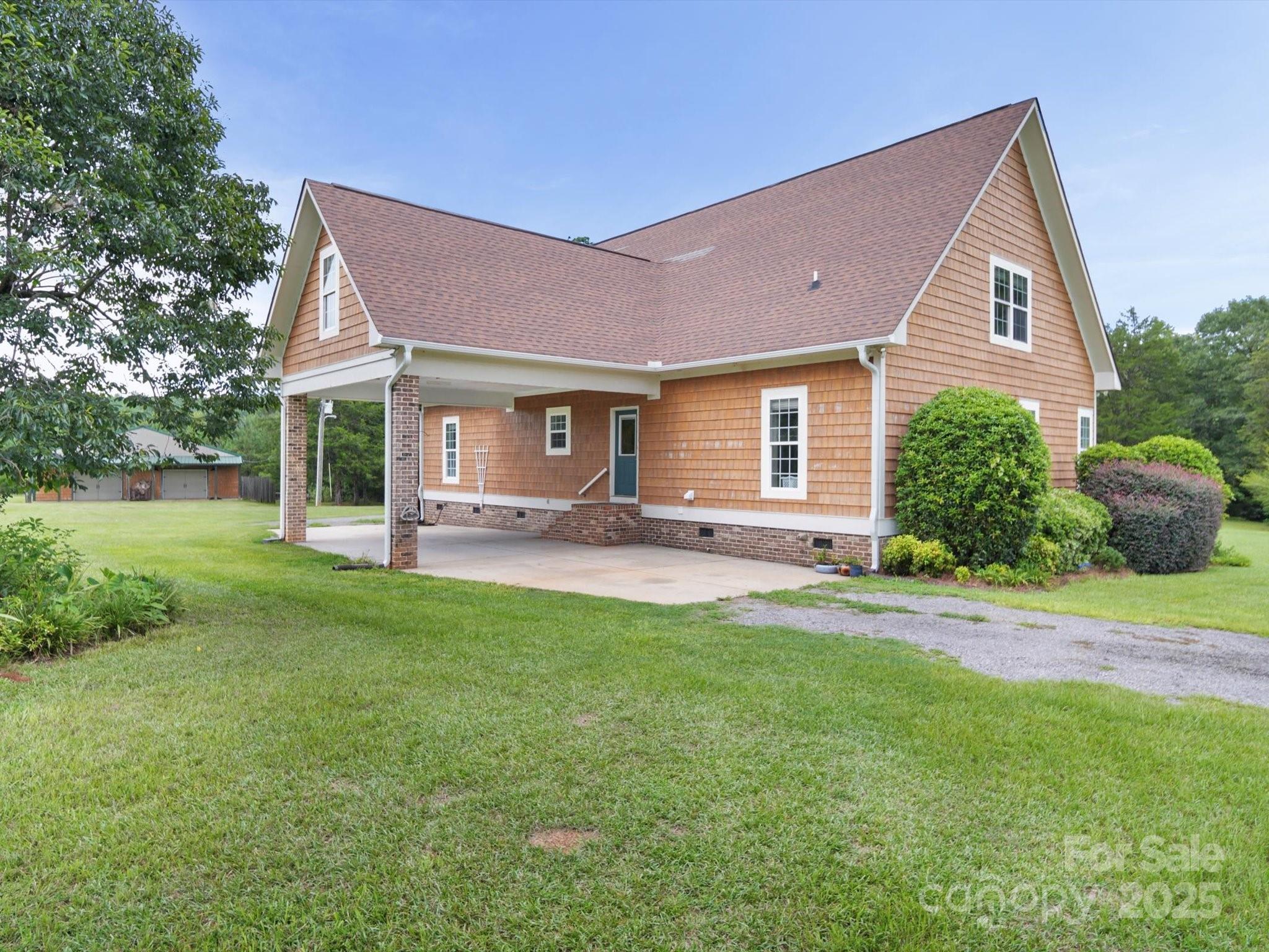1393 Wateree Road Ridgeway, SC 29130 - Photo 4 of 42 a front view of house with yard and green space