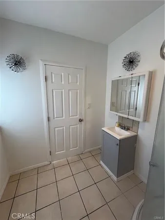 a view of room with furniture and wooden floor
