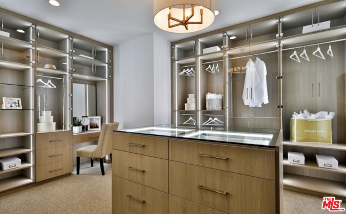 20400 Marlow Lane Porter Ranch, CA 91326 - Photo 16 of 21 a bathroom with a sink and a mirror