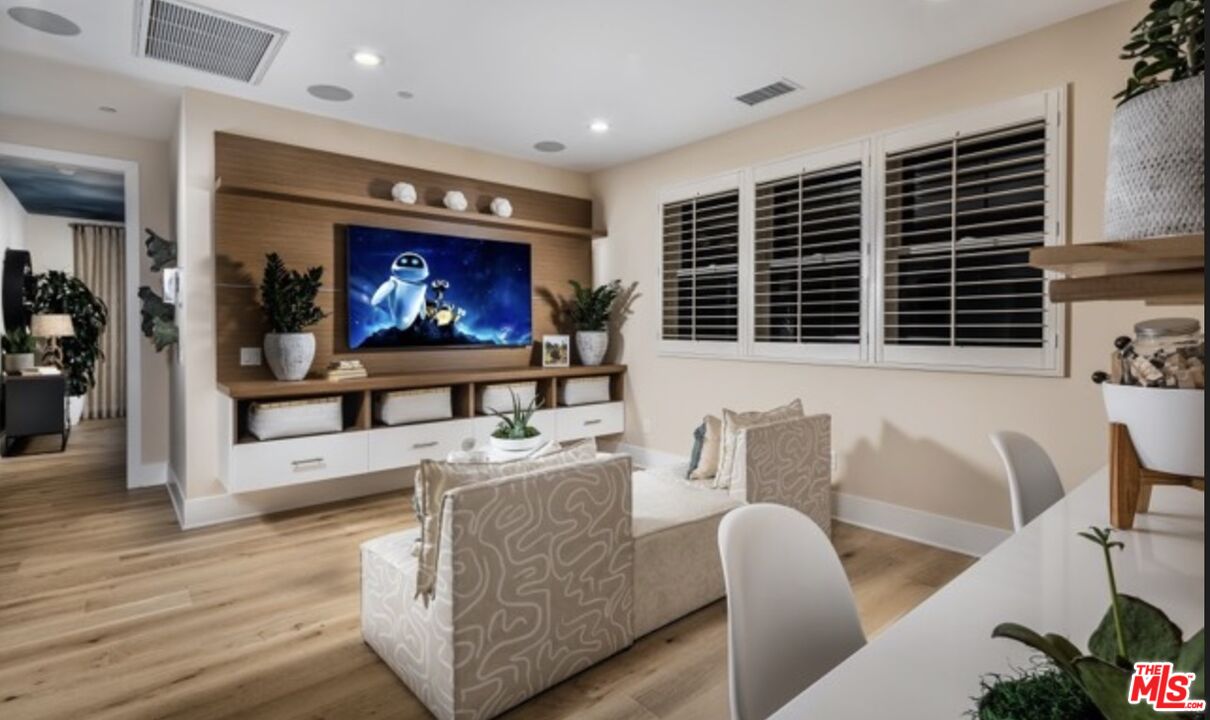 20400 Marlow Lane Porter Ranch, CA 91326 - Photo 19 of 21 a view of a dining room with furniture window and wooden floor