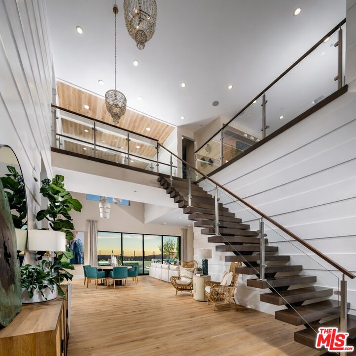 20400 Marlow Lane Porter Ranch, CA 91326 - Photo 4 of 21 a view of entryway and hall with wooden floor