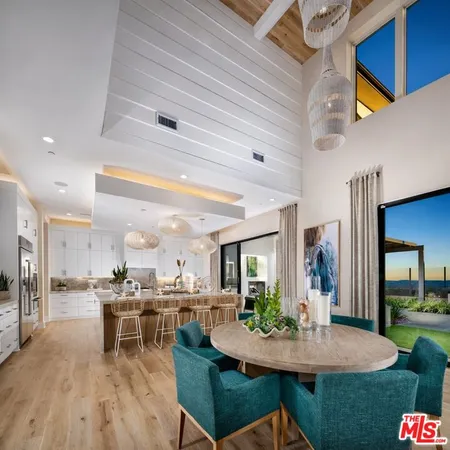 a view of a dining room kitchen and furniture