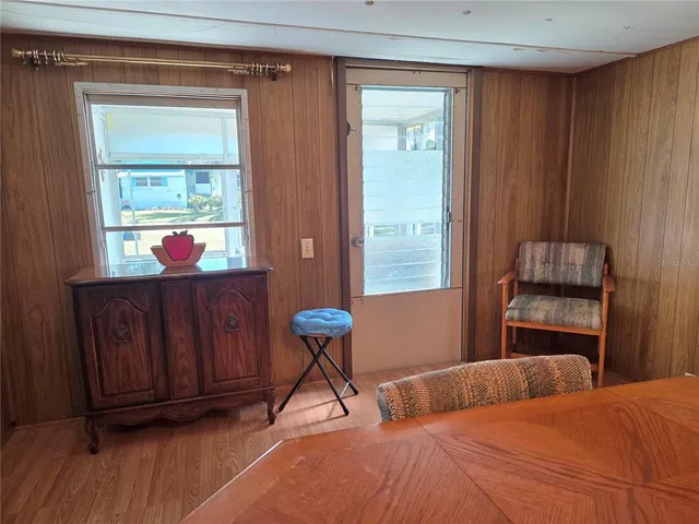 a spacious bathroom with a double vanity sink and a mirror
