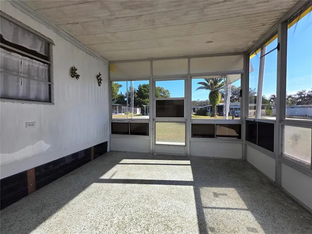 a bedroom with a bed and a table in it