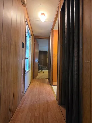 a view of a swimming pool with an outdoor space and seating area