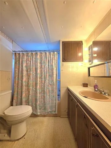 a view of an outdoor space and tennis court