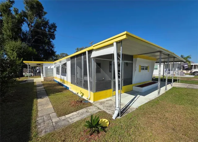 a view of an empty room with a couch