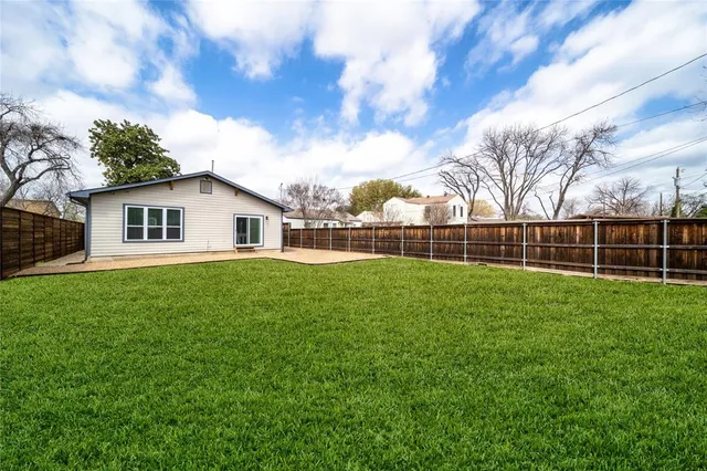 a view of a backyard with a garden