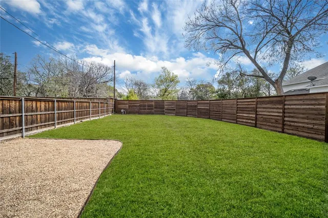 a view of a backyard with a garden