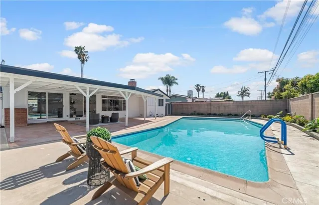 a view of a backyard with furniture