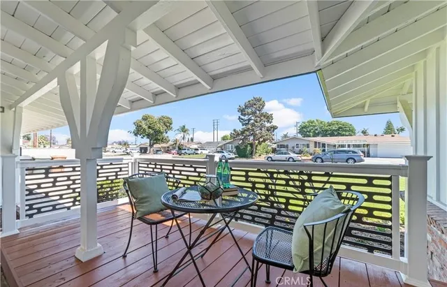 a view of a chairs and table in patio
