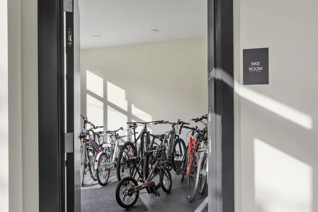an aerial view of residential building and lake view