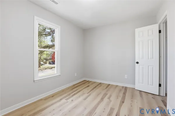 a view of a room that has a window in it