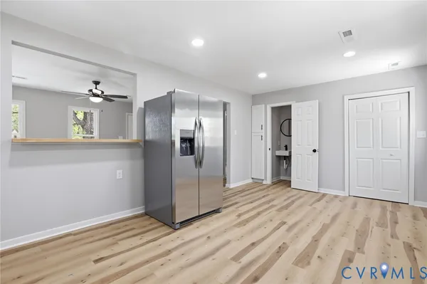 a view of a livingroom with wooden floor