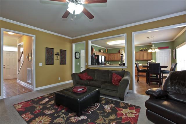 1167 Cynthia Lane Spring Hill, TN 37174 - Photo 5 of 20 a living room with furniture and wooden floor