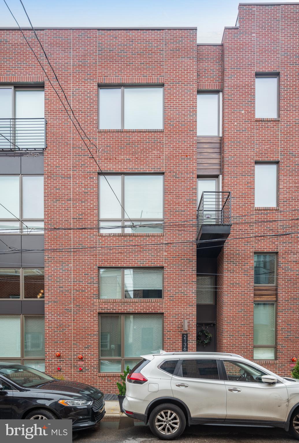 a car parked in front of a building