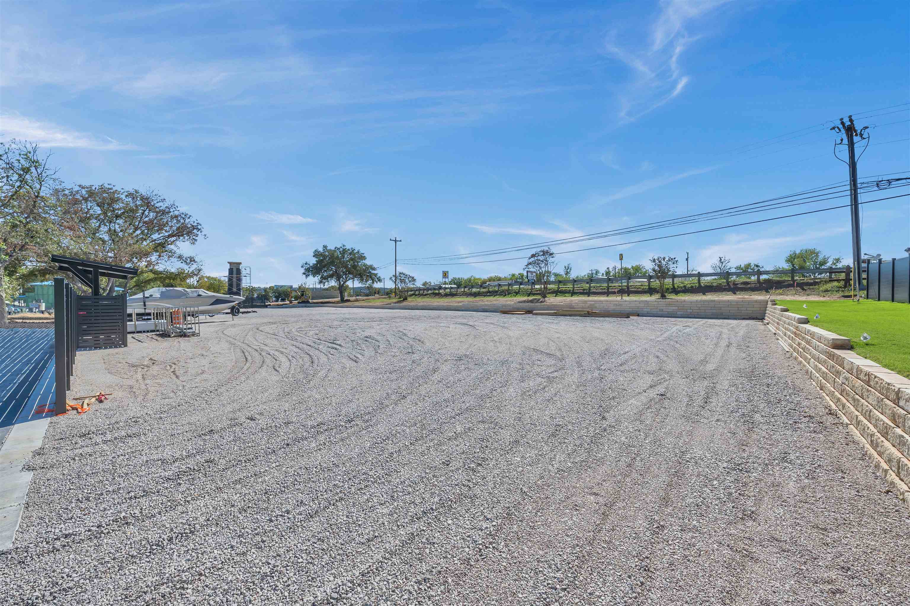 4 Lake Street Kingsland, TX 78639 - Photo 12 of 17 a view of a lake with a big yard
