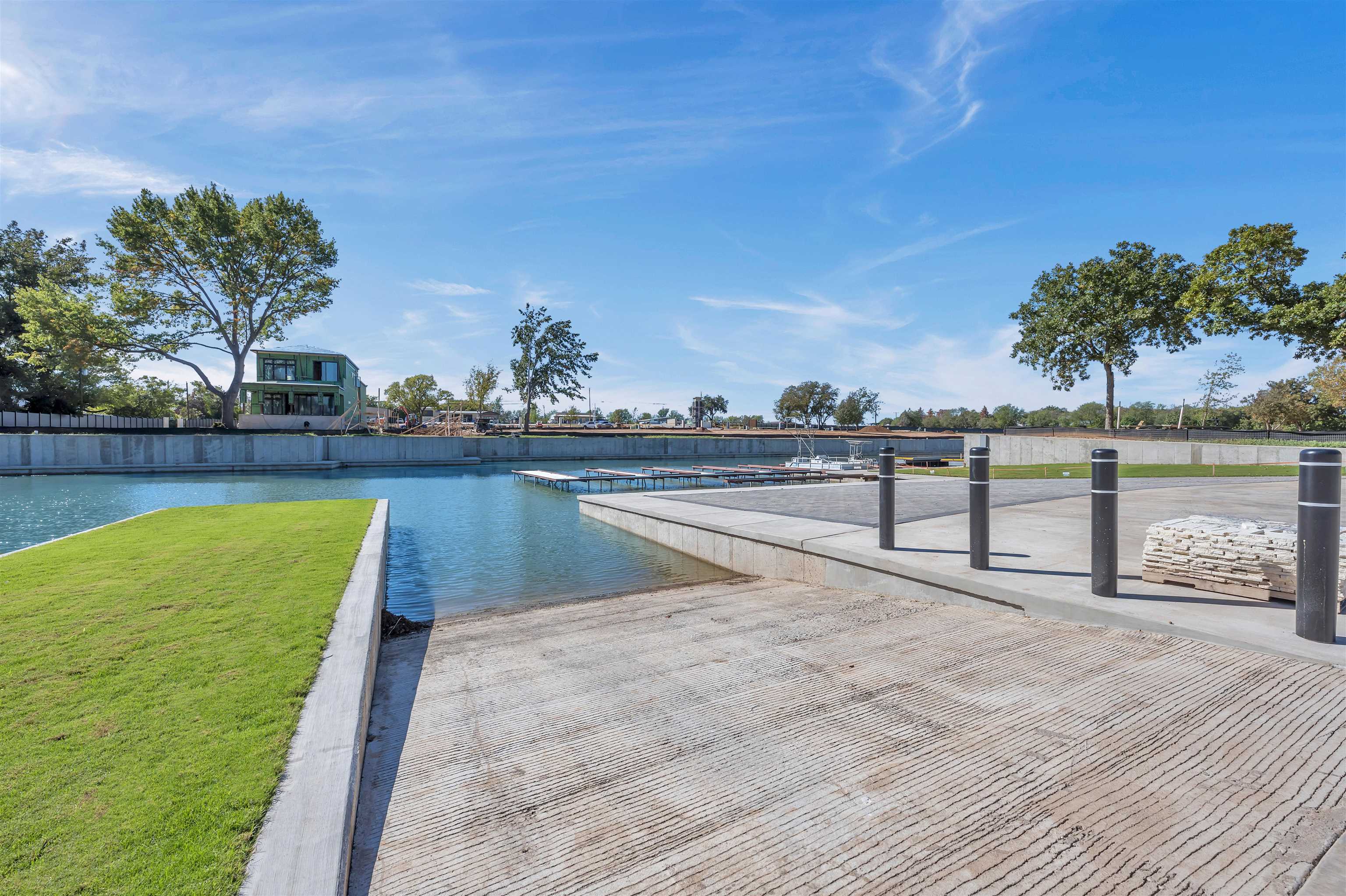 4 Lake Street Kingsland, TX 78639 - Photo 9 of 17 a view of a swimming pool with a lawn chairs