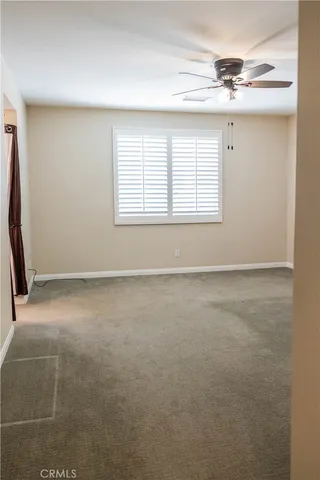 a bathroom with a shower and a window