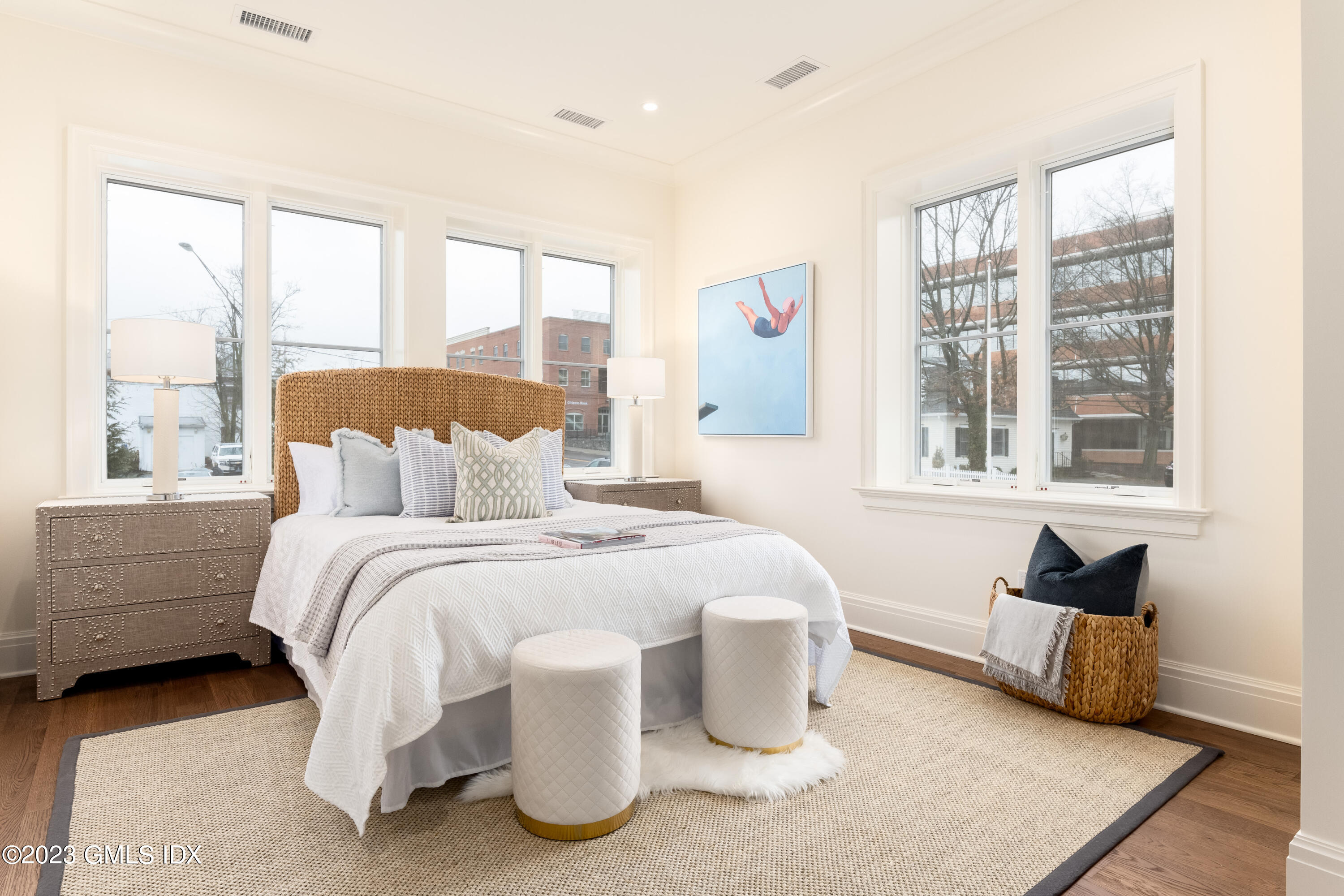 62 Mason Street, Unit 2W Greenwich, CT 06830 - Photo 13 of 18 a bedroom with a bed and a large window