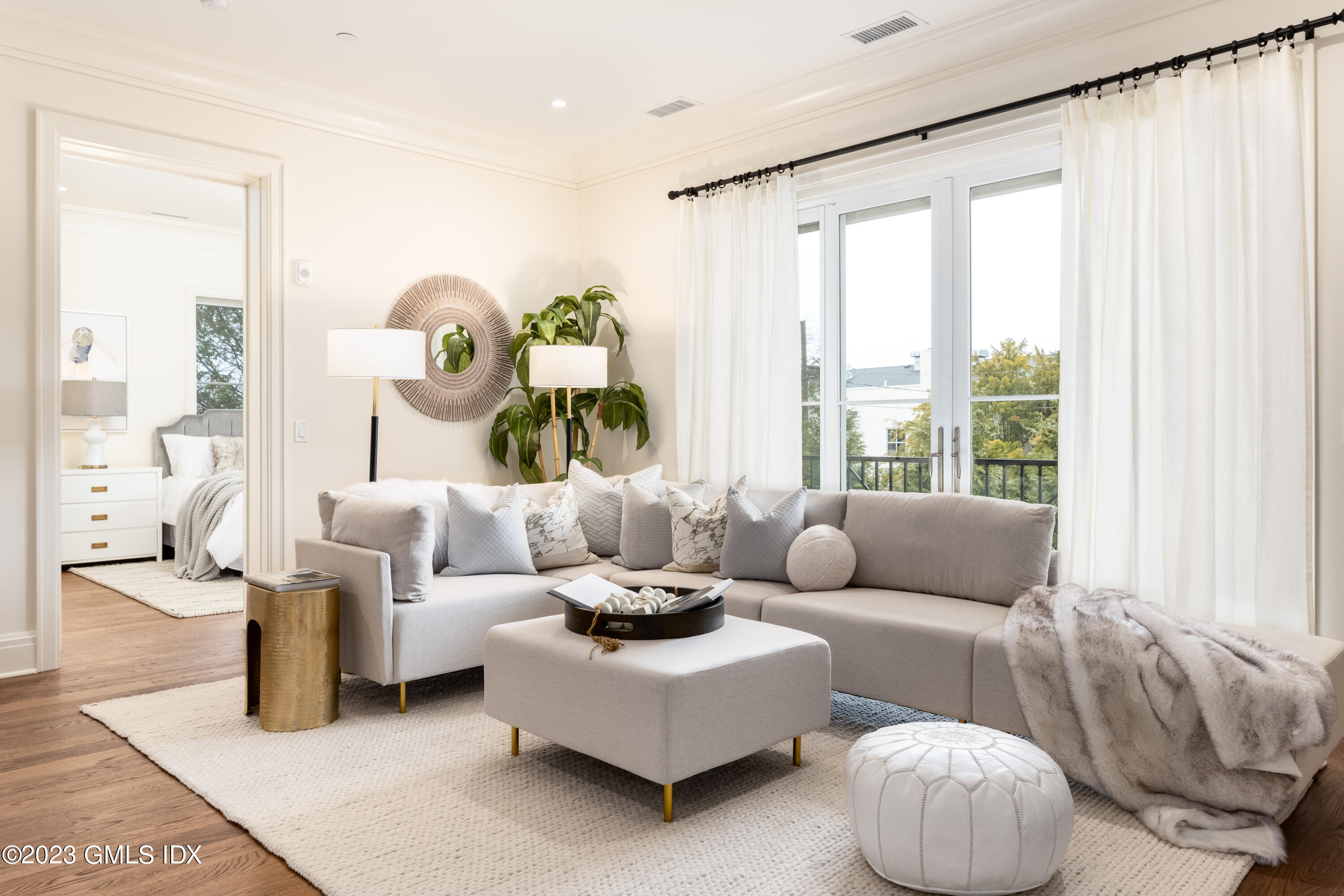62 Mason Street, Unit 2W Greenwich, CT 06830 - Photo 3 of 18 a living room with furniture and a large window