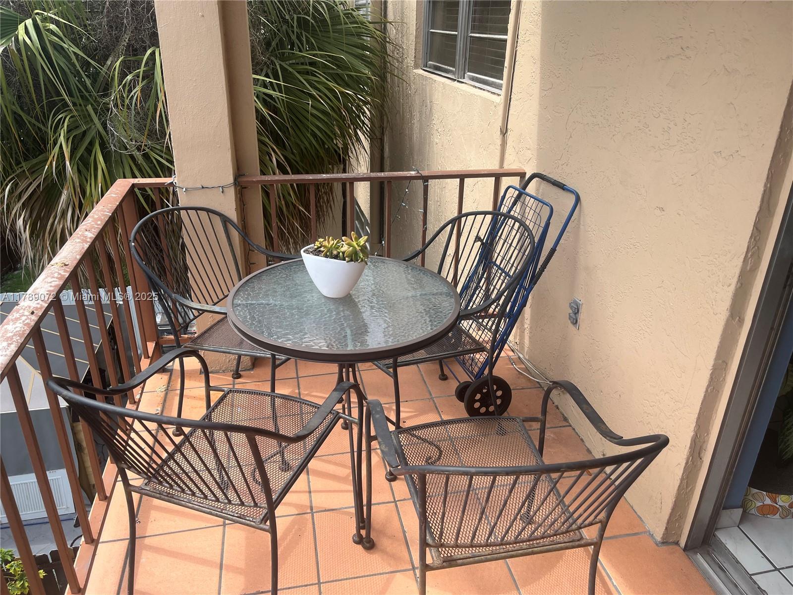 10851 Southwest 2nd Street, Unit K304 Sweetwater, FL 33174 - Photo 12 of 16 a view of balcony and patio