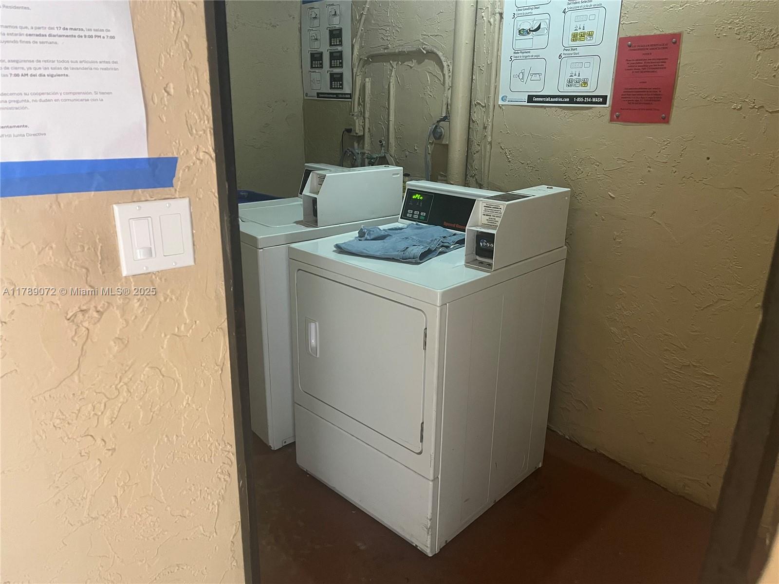 10851 Southwest 2nd Street, Unit K304 Sweetwater, FL 33174 - Photo 14 of 16 a utility room with dryer and washer