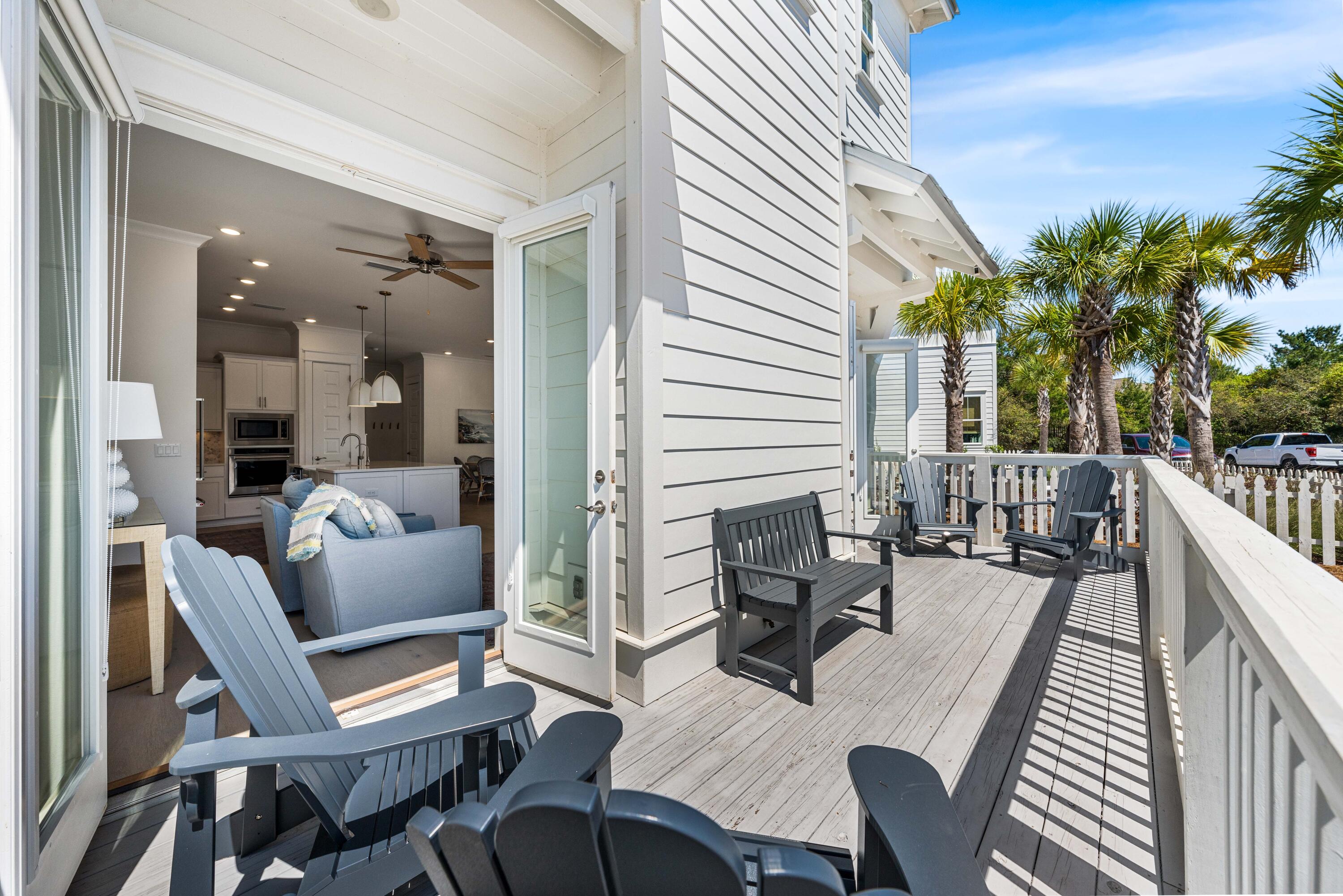 144 Wharf Ln Inlet Beach, Unit A Inlet Beach, FL 32461 - Photo 13 of 48 a outdoor space with patio furniture