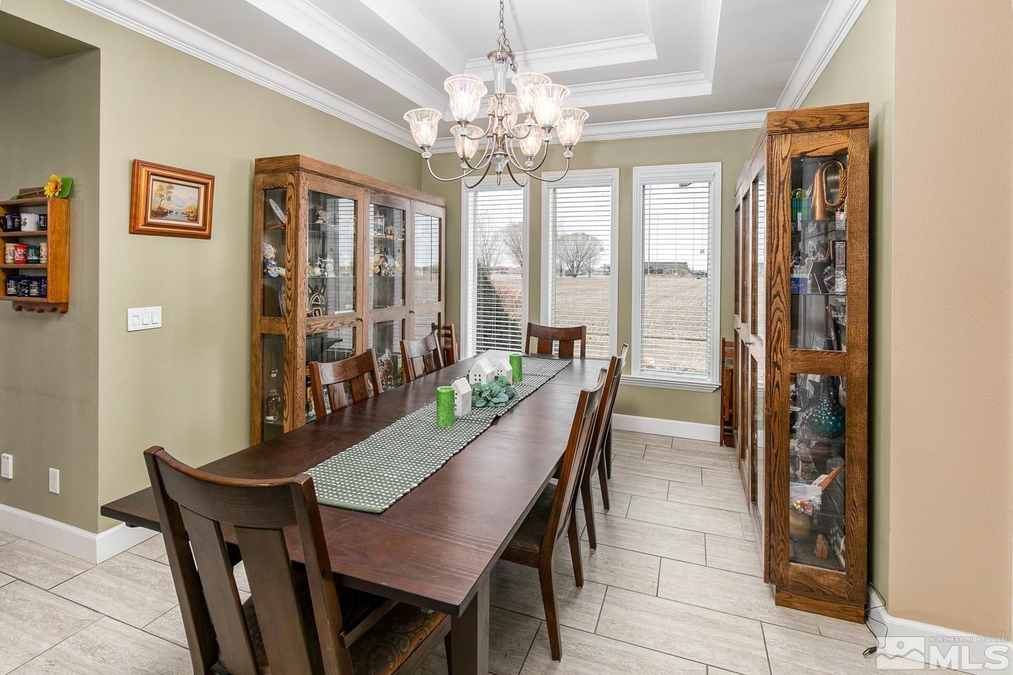 3774 Red Mountain Road Fallon, NV 89406 - Photo 14 of 37 a view of a dining room with furniture and chandelier