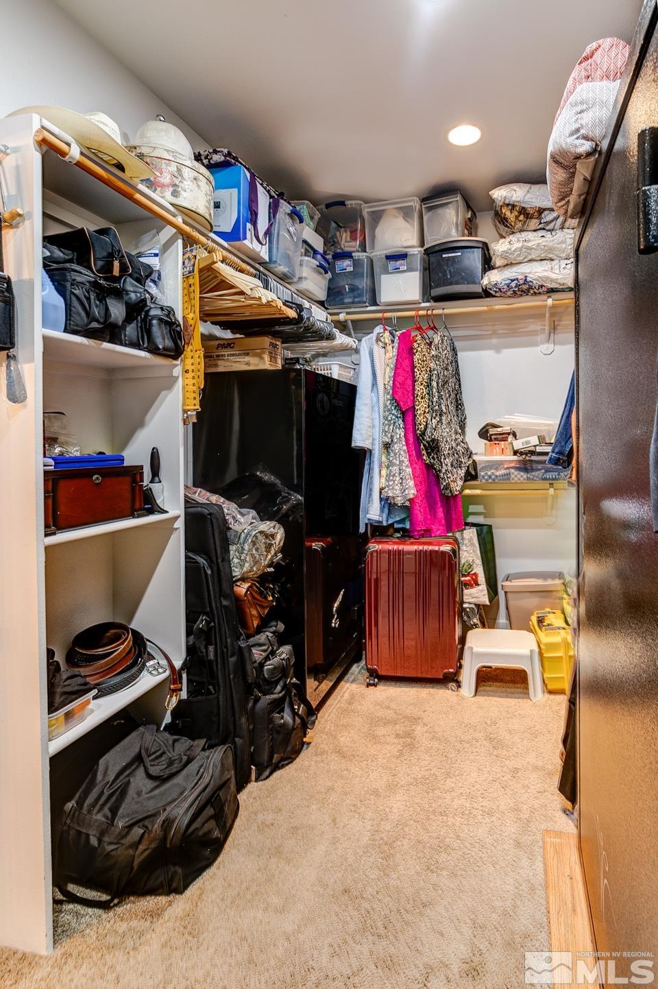 3774 Red Mountain Road Fallon, NV 89406 - Photo 17 of 37 a view of walk in closet with clothes and shoes