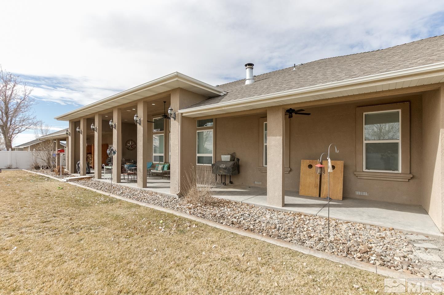3774 Red Mountain Road Fallon, NV 89406 - Photo 33 of 37 a view of a house with a patio