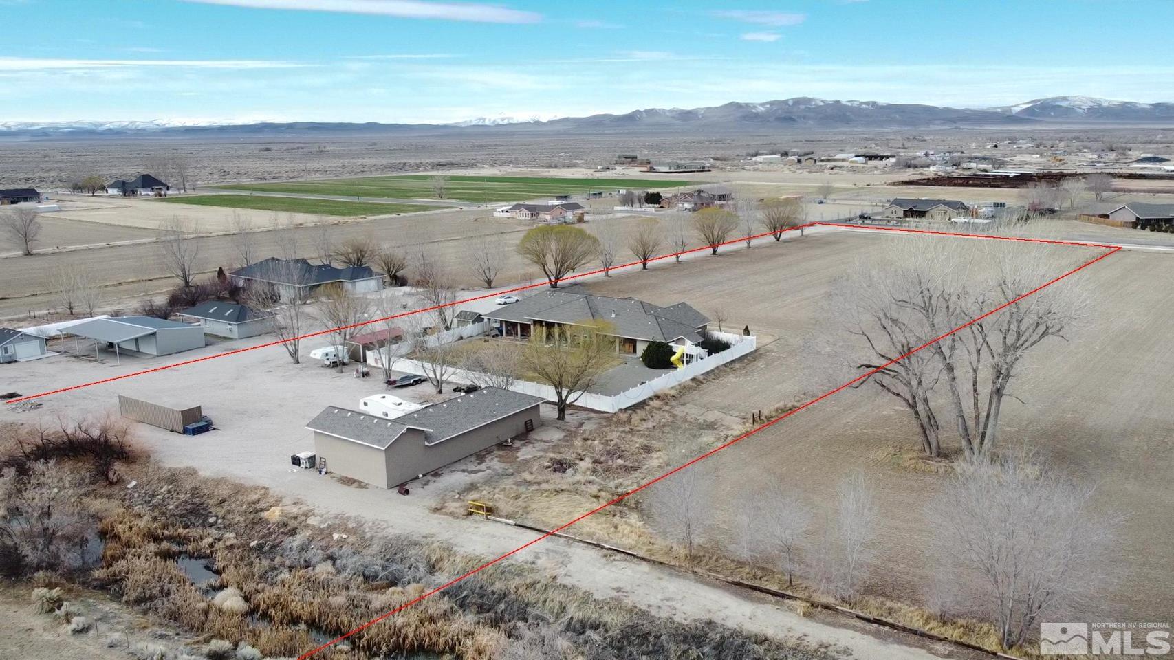 3774 Red Mountain Road Fallon, NV 89406 - Photo 4 of 37 an aerial view of a house with outdoor space