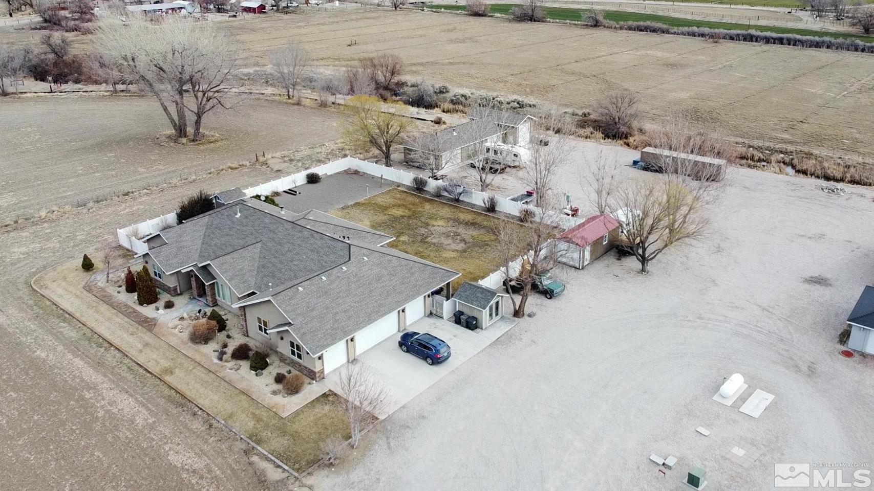 3774 Red Mountain Road Fallon, NV 89406 - Photo 5 of 37 an aerial view of a house with a yard
