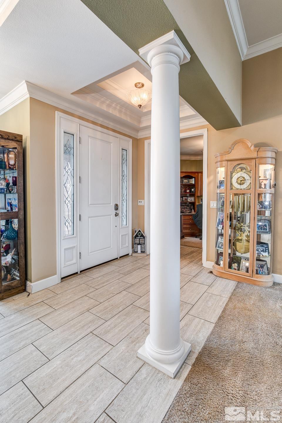 3774 Red Mountain Road Fallon, NV 89406 - Photo 7 of 37 a view of a hallway with wooden shelves