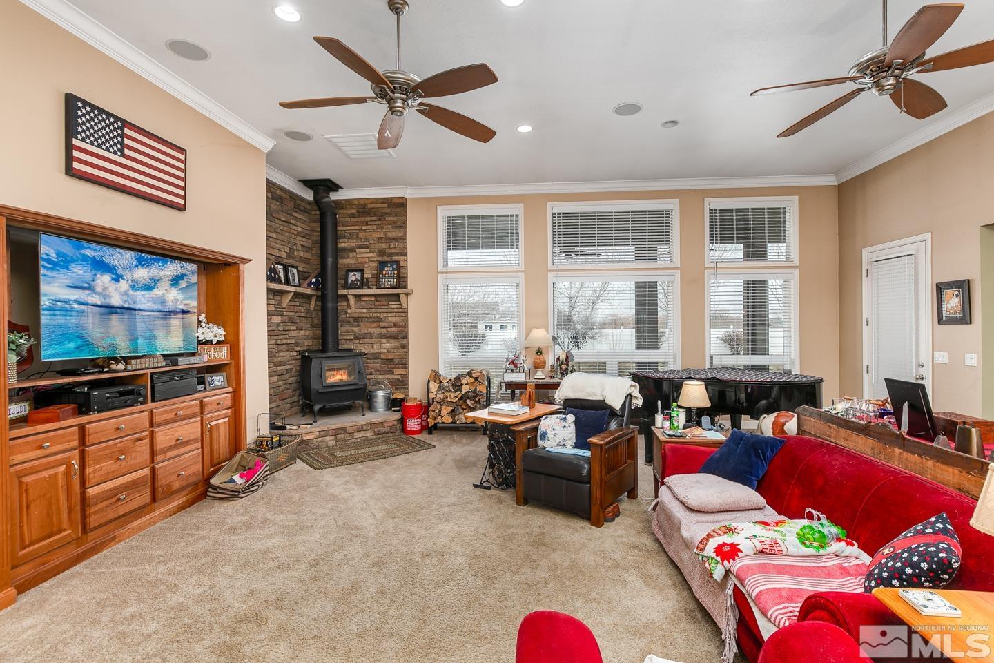 3774 Red Mountain Road Fallon, NV 89406 - Photo 8 of 37 a living room with furniture and a flat screen tv