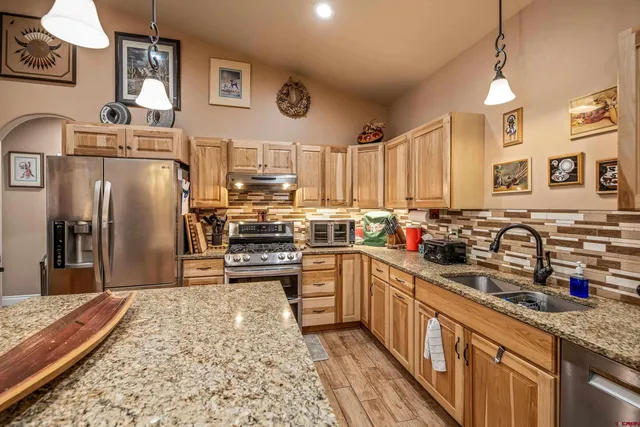 a living room with furniture rug and window