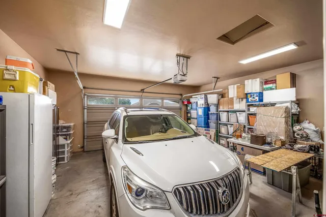 a view of a livingroom with furniture and windows