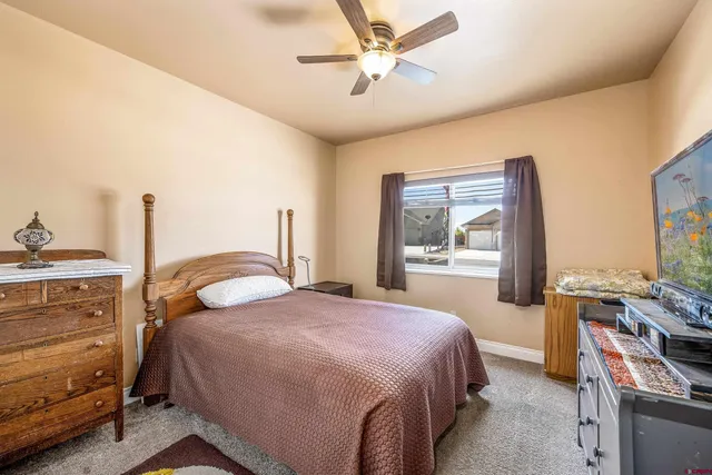 a bedroom with a bed and a walk in closet