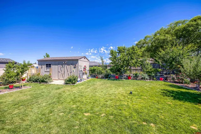 a view of yard with an outdoor seating