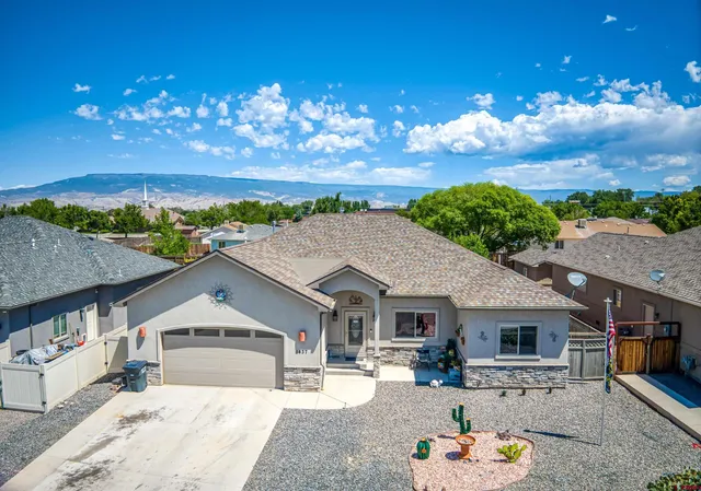 a outdoor space with lots of white furniture